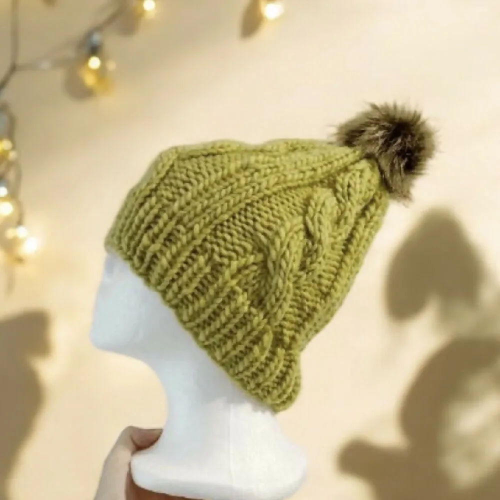 Cable Hand Knit Slouchy Beanie in green with brown pompom