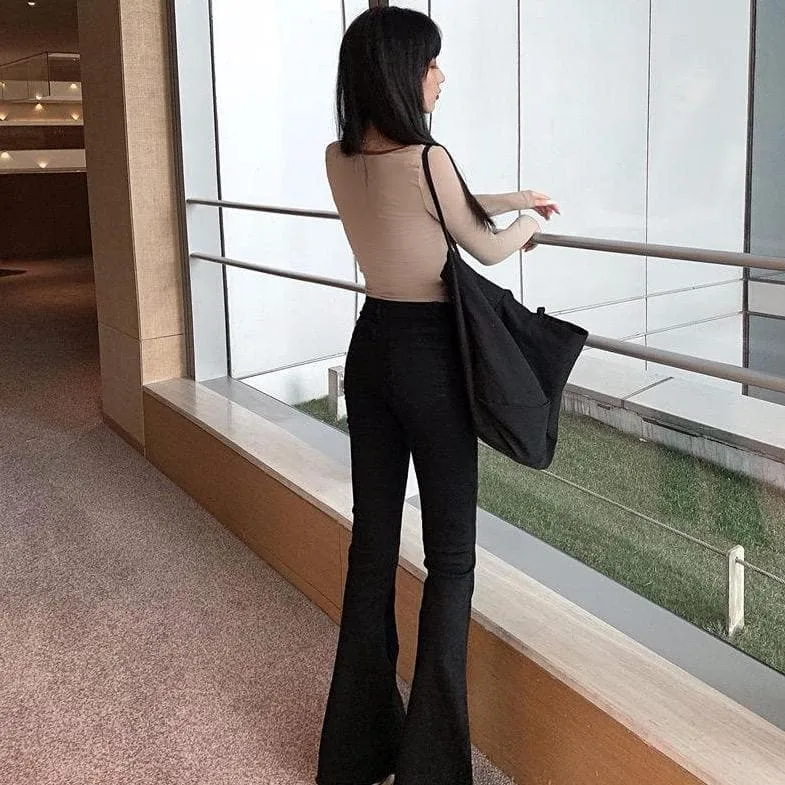 Flared Jeans With Ripped Details