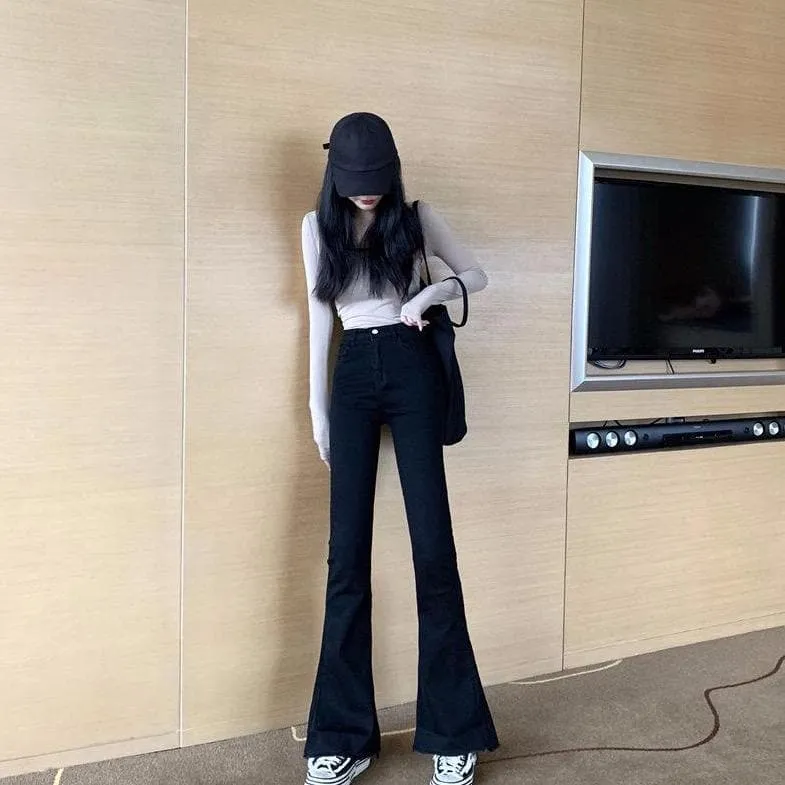 Flared Jeans With Ripped Details