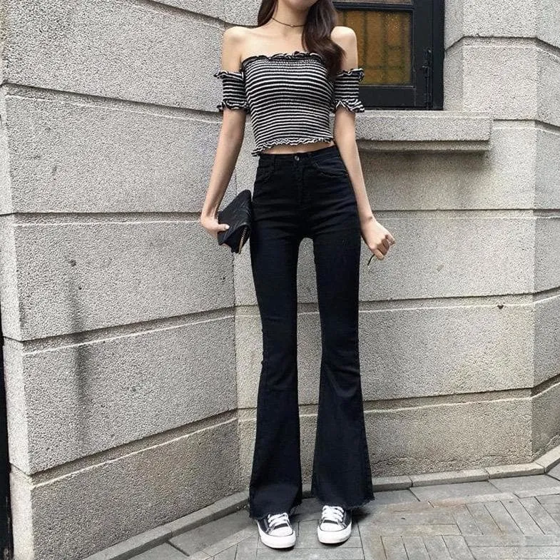 Flared Jeans With Ripped Details
