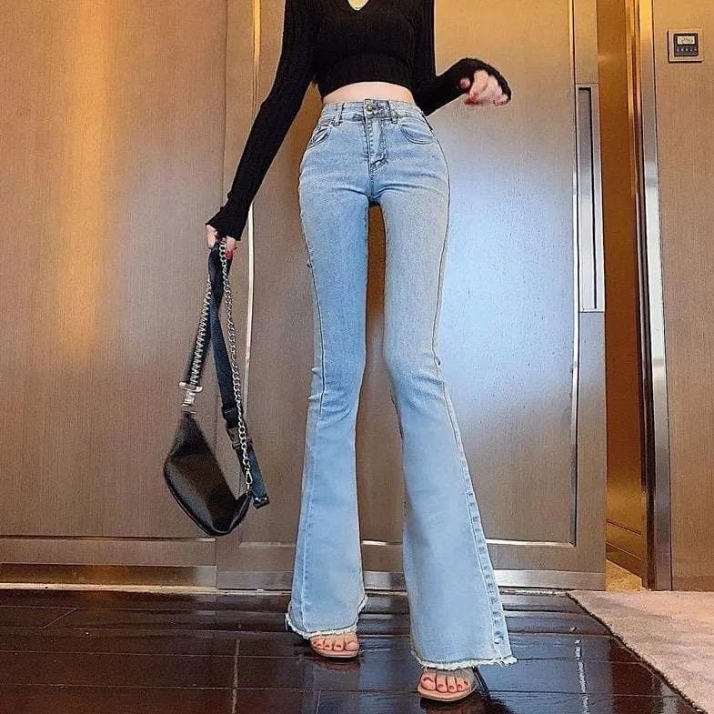 Flared Jeans With Ripped Details